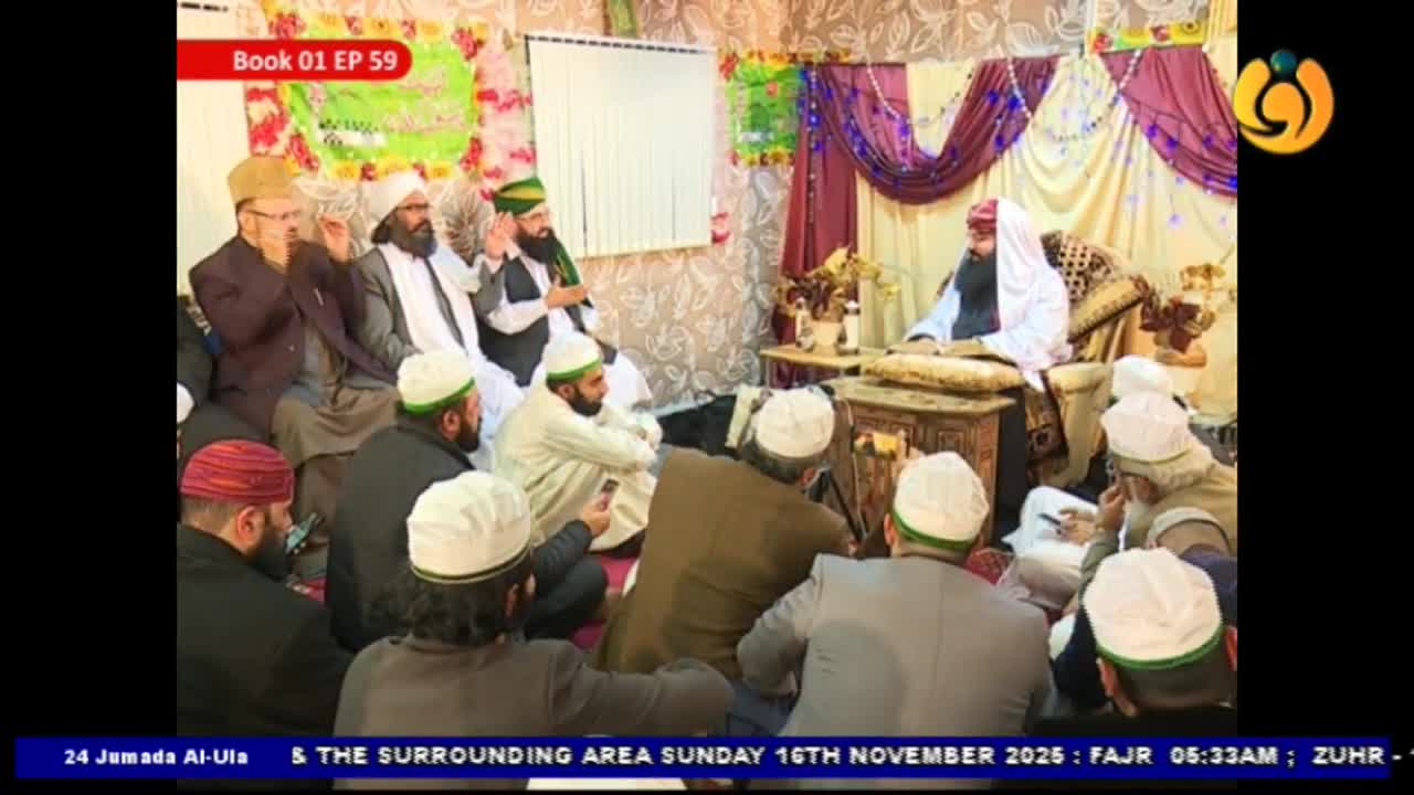 A group of men, many wearing white caps, are seated on the floor in a room. At the front, a man with a white turban and beard sits behind a small table, likely addressing the gathering.
A group of men, many wearing white caps, are seated on the floor in a room. At the front, a man with a white turban and beard sits behind a small table, likely addressing the gathering.