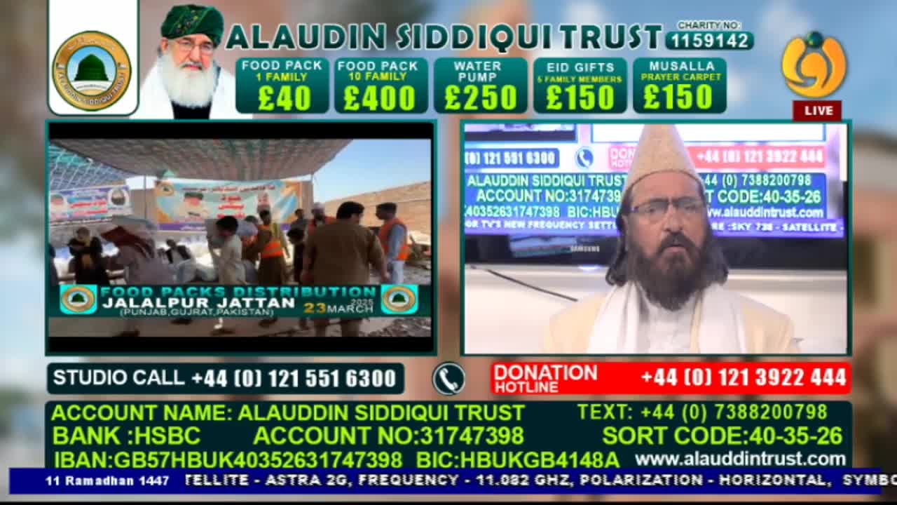 A man in a white robe and a light brown cap speaks directly to the camera, his beard framing his face. Beside him, a screen shows a bustling scene of food pack distribution in Jalalpur Jattan, Pakistan. A man in a white robe and a light brown cap speaks directly to the camera, his beard framing his face. Beside him, a screen shows a bustling scene of food pack distribution in Jalalpur Jattan, Pakistan.