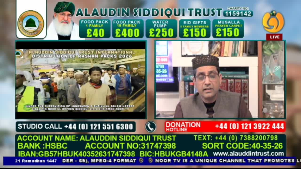 A man in a dark cap and glasses speaks from a studio, while a screen behind him shows a crowd of people. On the left, a banner displays donation options for the Alaudin Siddiqui Trust.