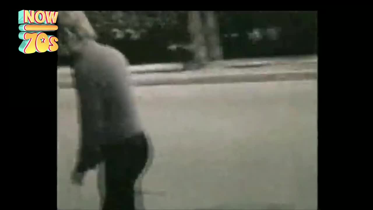 A person, wearing a light-colored shirt and dark trousers, is moving to the left. The scene is shot in black and white, and the person's movement is somewhat blurred.
A person, wearing a light-colored shirt and dark trousers, is moving to the left. The scene is shot in black and white, and the person's movement is somewhat blurred.