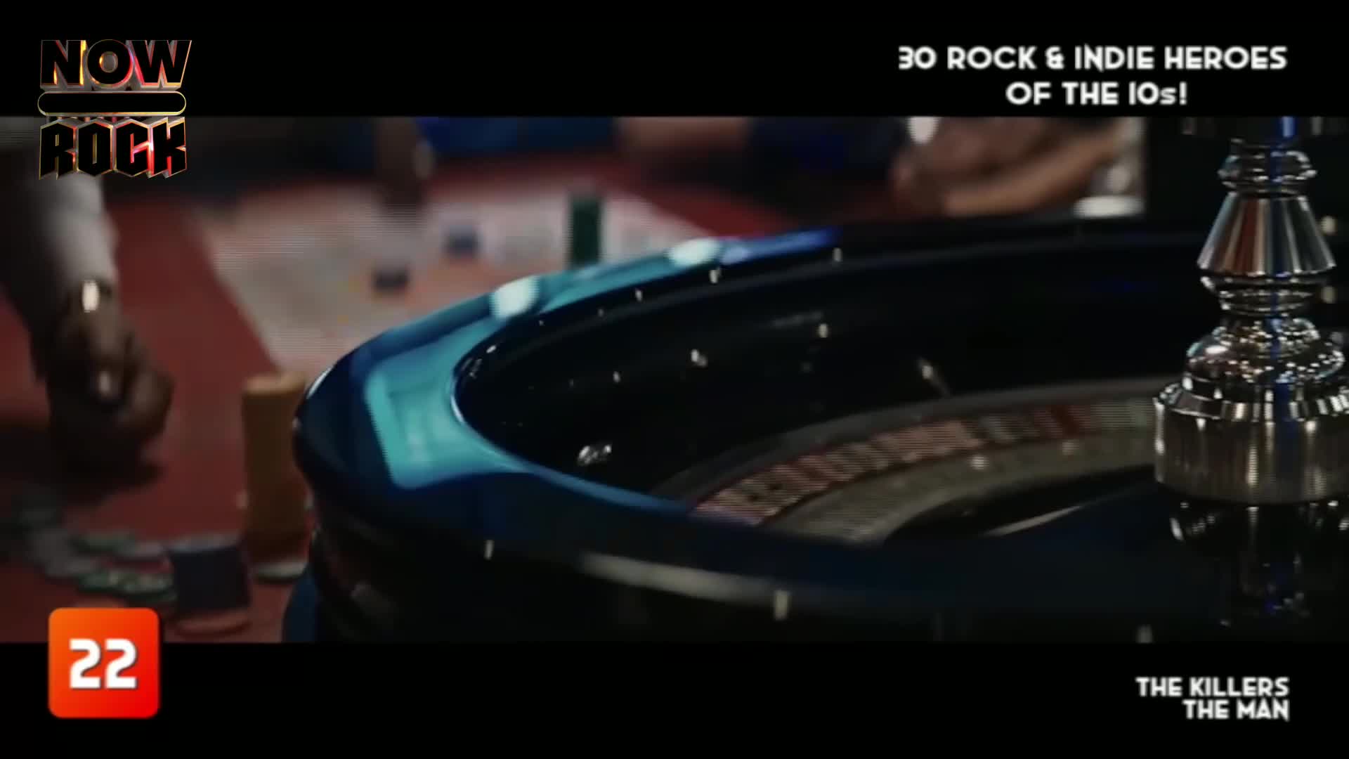 The roulette wheel spins, its dark surface reflecting the overhead lights. A hand reaches out to gather chips from the red felt table. The roulette wheel spins, its dark surface reflecting the overhead lights. A hand reaches out to gather chips from the red felt table.