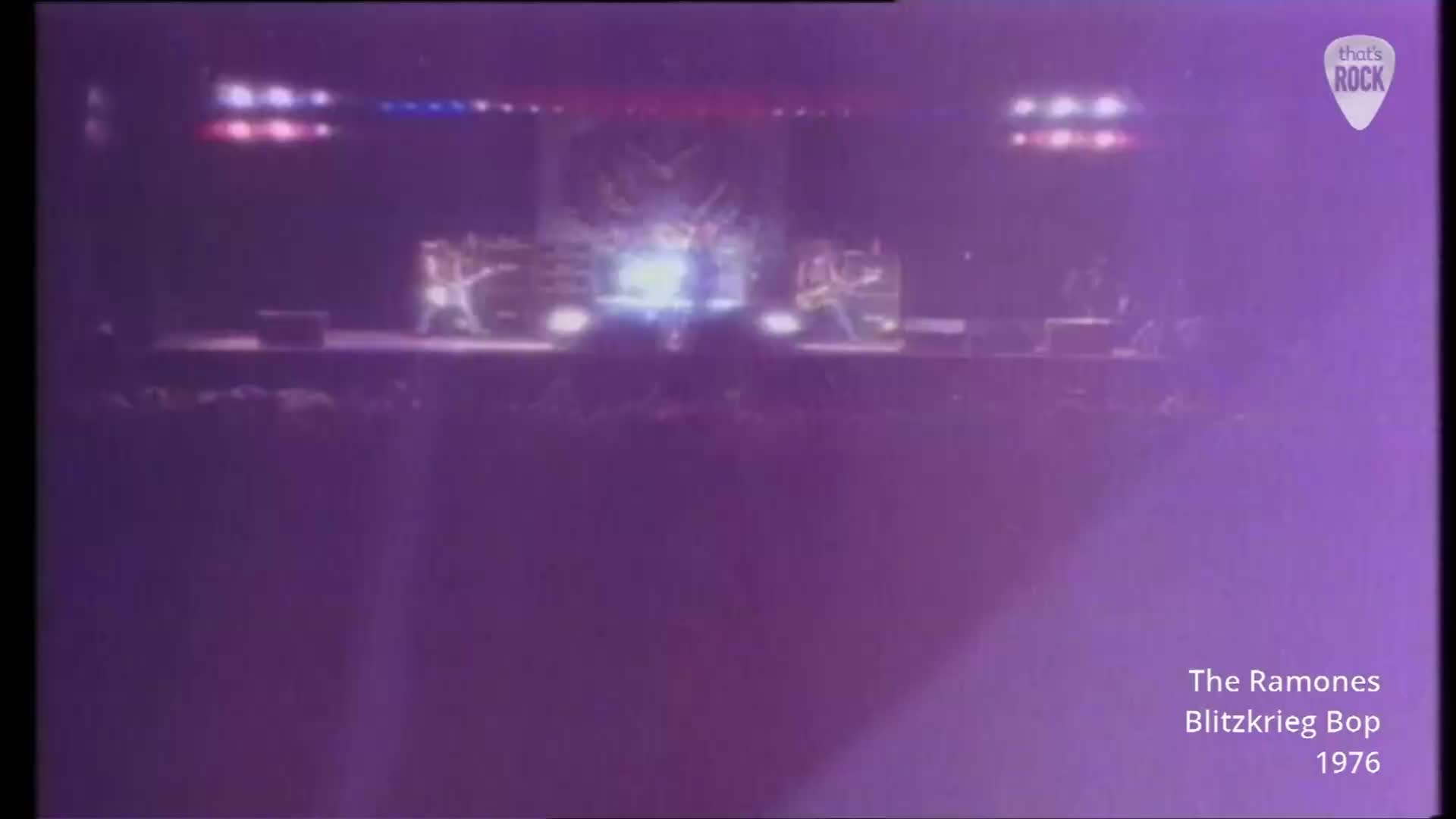 The Ramones are tearing it up on stage, bathed in bright white light. Their guitars are a blur as they thrash through "Blitzkrieg Bop" in 1976. The Ramones are tearing it up on stage, bathed in bright white light. Their guitars are a blur as they thrash through "Blitzkrieg Bop" in 1976.