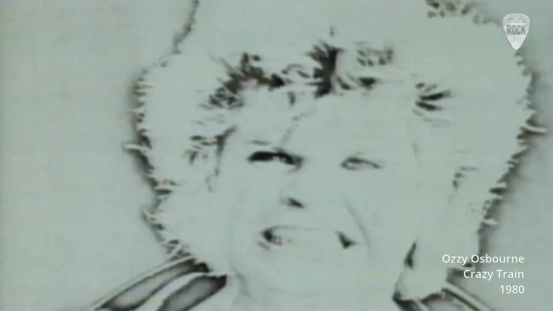Ozzy Osbourne's face fills the screen, his wild hair a stark contrast to his intense gaze. The grainy black and white footage, reminiscent of early music videos, captures a raw energy.