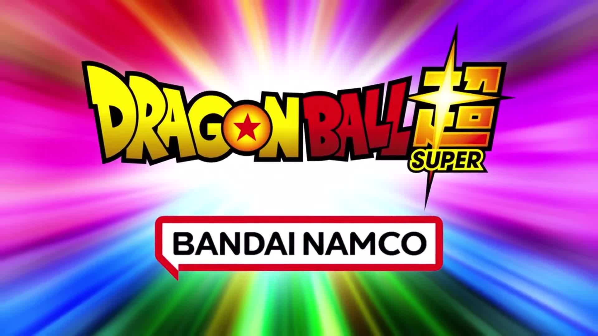 The "Dragon Ball Super" logo, in bold yellow and red, sits atop a burst of colorful, radiating light. Below, a red-bordered white speech bubble announces "BANDAI NAMCO."
