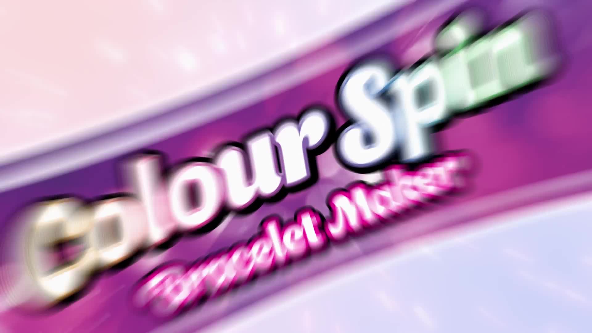 The words "Colour Spin" and "Bracelet Maker" are blurred together on a purple background, with white and pink highlights. The image is angled, creating a sense of movement.

