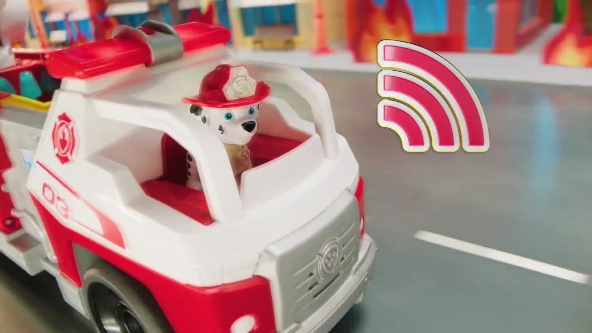 A Dalmatian puppy in a firefighter's hat sits in a toy fire truck, ready for action. A signal icon floats nearby, suggesting a call to duty.
