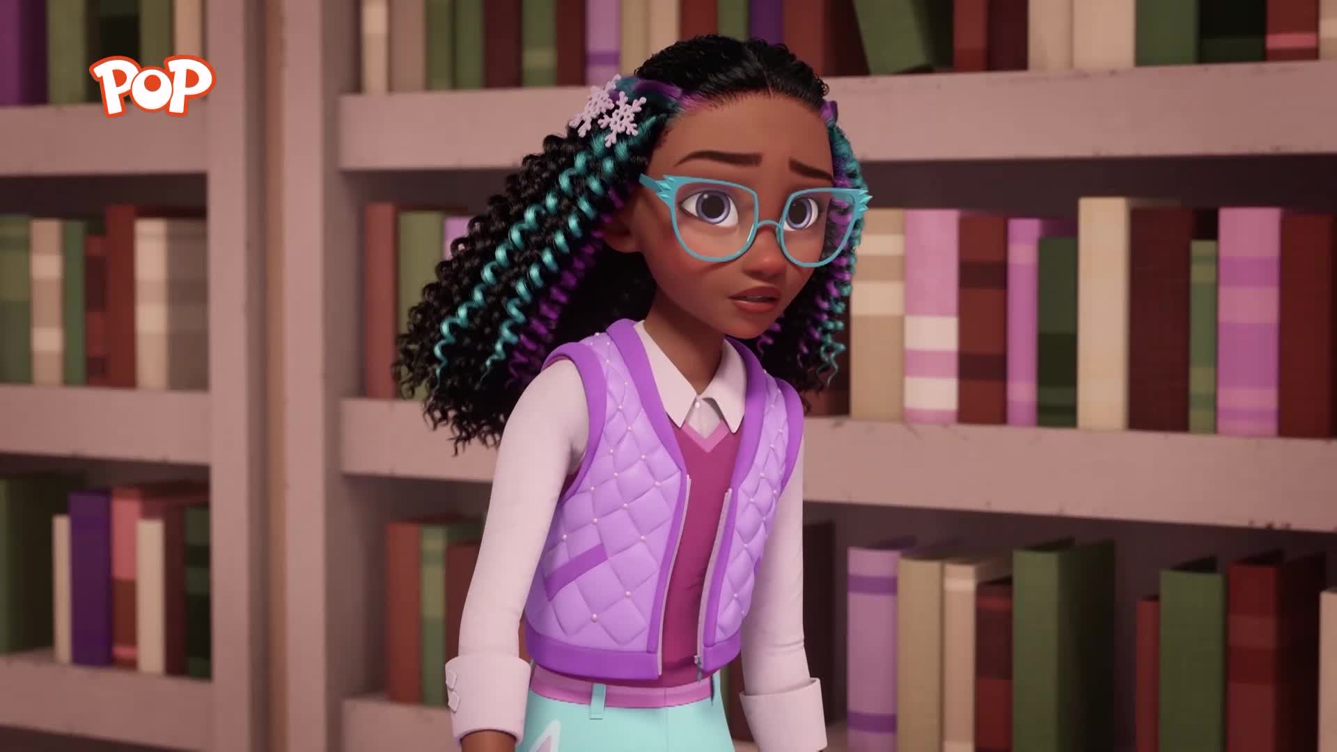 A young girl with bright turquoise and purple braids stands before shelves of books. She wears a lavender quilted vest over a pink sweater and light blue trousers, her expression thoughtful.