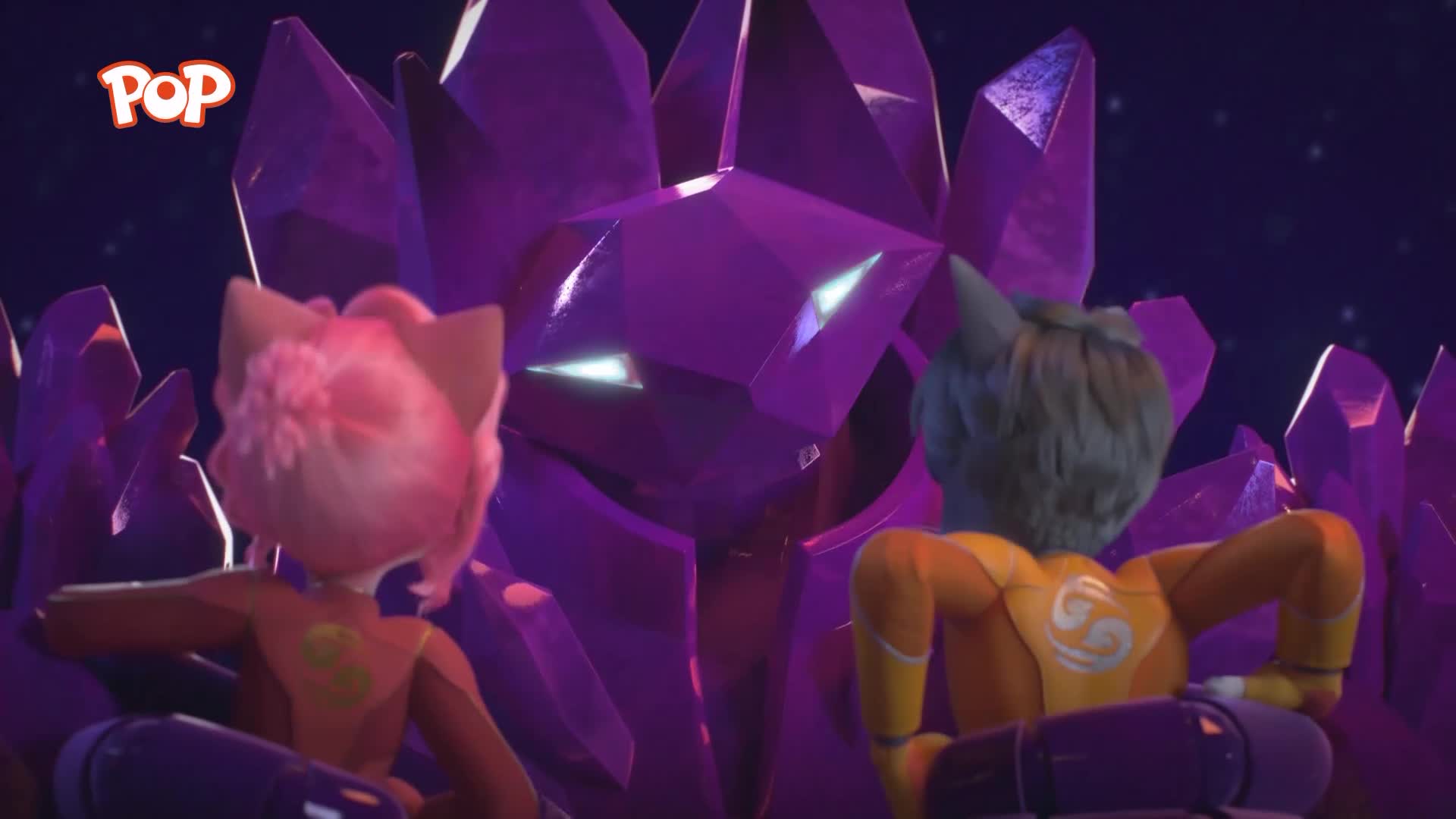 Two figures, one with pink fur and the other with grey, sit facing a towering, faceted purple crystal creature. The creature's eyes glow with an eerie white light against the dark, starry background.
