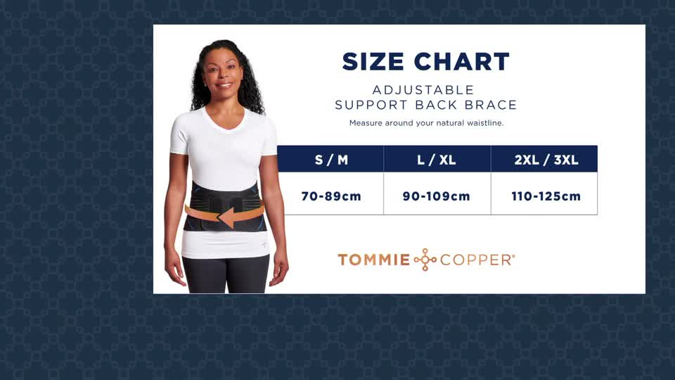 A woman wearing a back brace stands next to a size chart, which details the measurements for the brace. The chart is labeled "Adjustable Support Back Brace" and includes the Tommie Copper logo.
