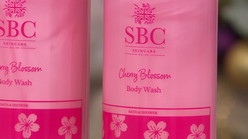 Two pink bottles of SBC Cherry Blossom Body Wash stand side-by-side, their labels clearly visible. The design features a Union Jack crest, with the words "SKINCARE" and "Since 1986" printed on the top.
Two pink bottles of SBC Cherry Blossom Body Wash stand side-by-side, their labels clearly visible. The design features a Union Jack crest, with the words "SKINCARE" and "Since 1986" printed on the top.