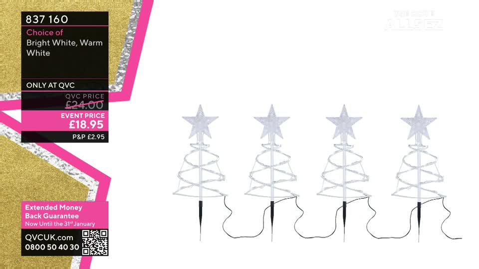 Four illuminated Christmas tree decorations stand against a white background, each topped with a star. The QVC Extra graphic in the corner highlights the price and a money-back guarantee.
