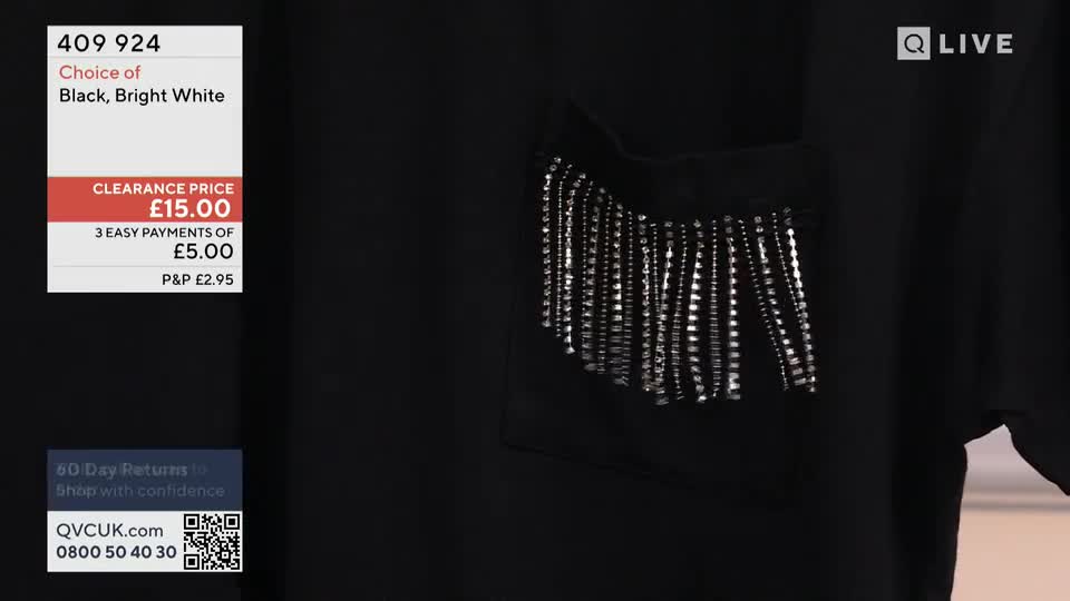 A black top is being shown on QVC, with a pocket embellished with dangling, shiny beads. The price is clearly displayed on the screen, offering easy payments.
