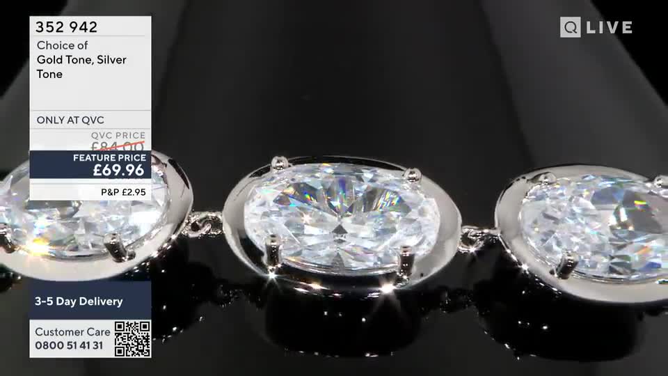 A close-up showcases a silver bracelet, each link holding a large, sparkling oval stone. The QVC logo and price details are visible in the top left corner.
