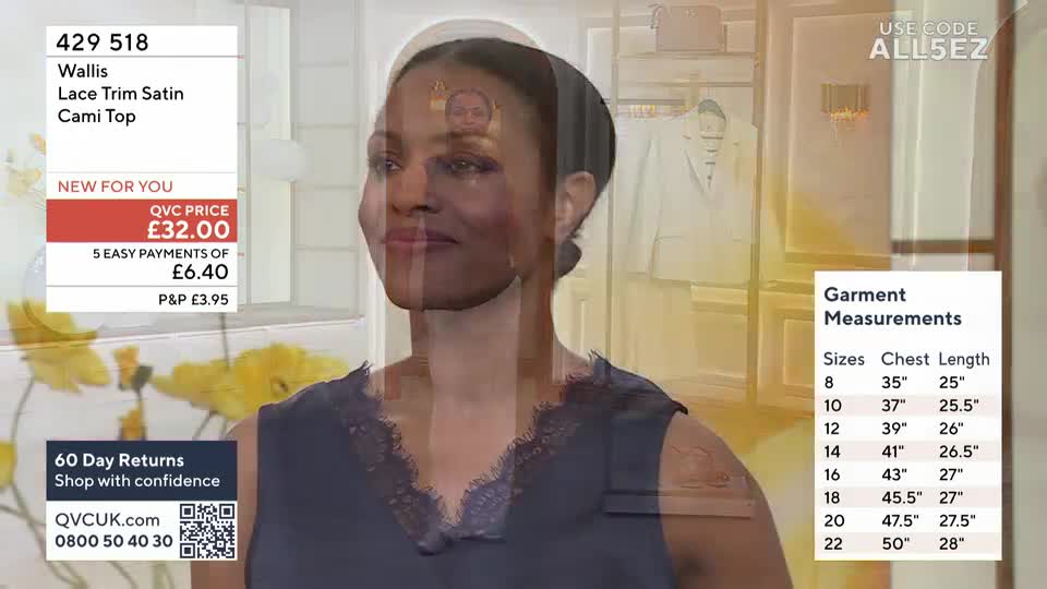 A woman models a dark blue cami top with lace trim, her face softly lit. Information about the Wallis brand and garment measurements appears on screen.
