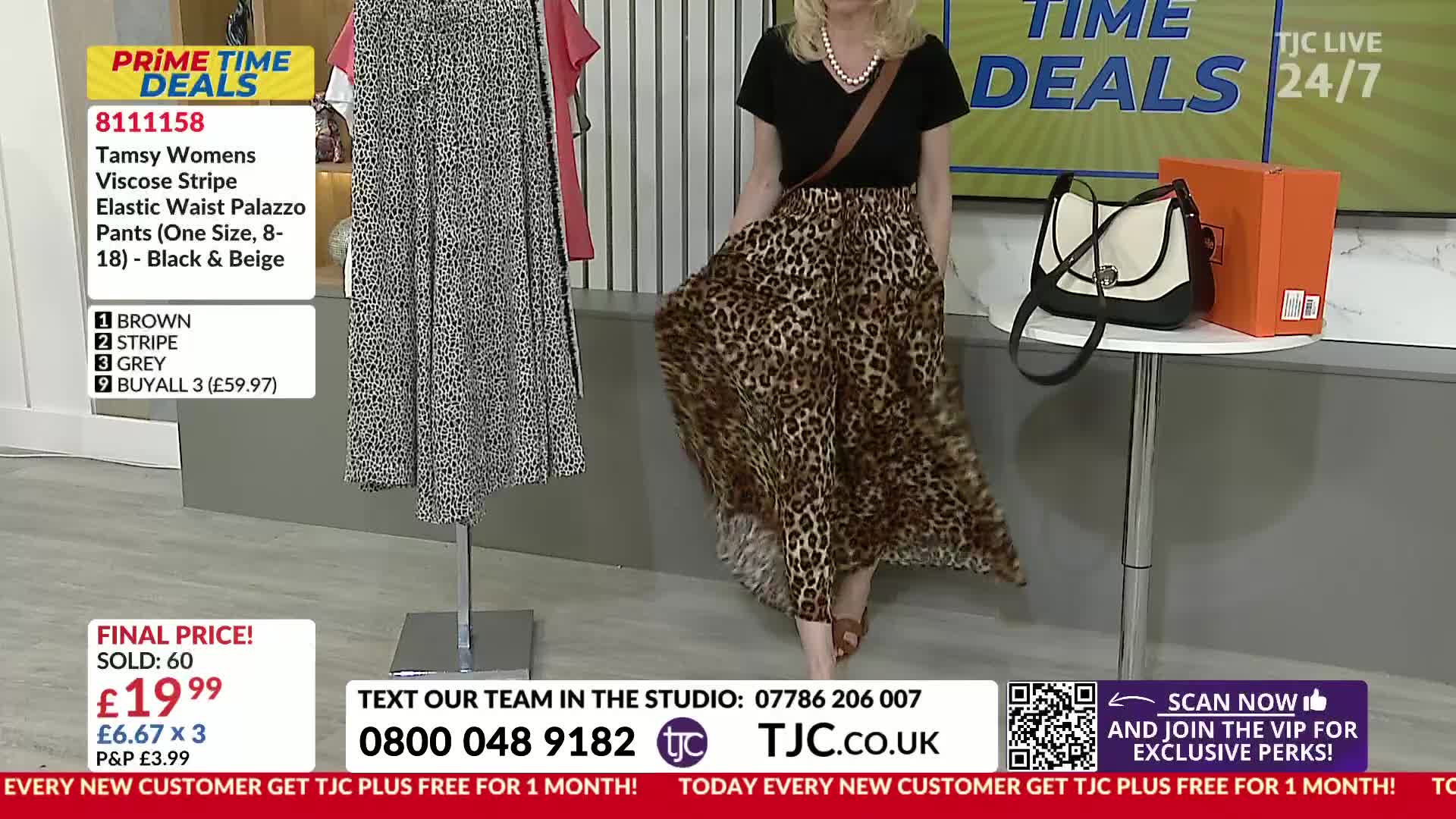 A woman in a black top and leopard-print palazzo pants is walking forward, the fabric swirling around her legs on the TJC set. Beside her, a mannequin displays a similar pair of pants in a different pattern.
