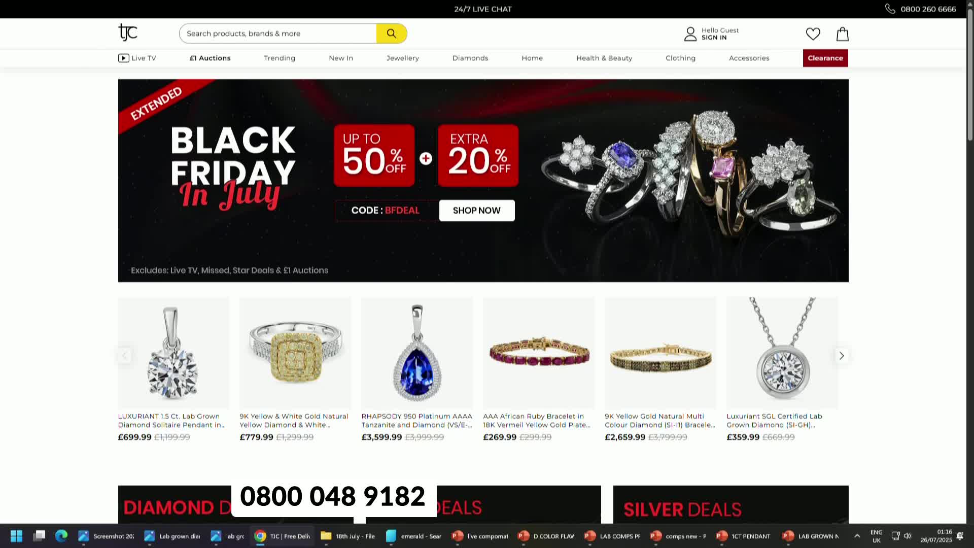 A screen displays a TJC website, advertising "Black Friday in July" with deals on jewelry. Below the banner, various rings, pendants, and bracelets are shown with prices.
