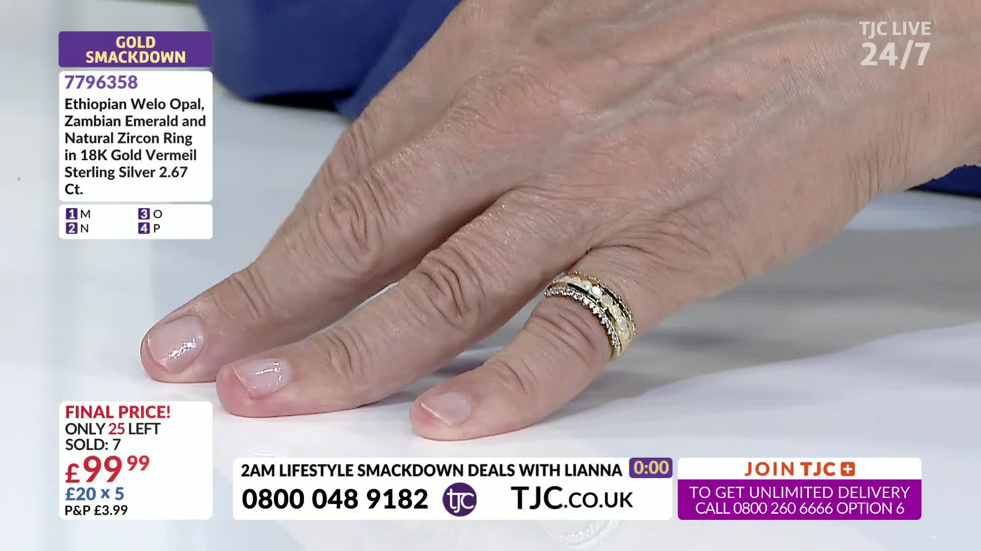 A hand with polished nails rests on a surface, showcasing a ring. The TJC logo and a price tag are visible in the corner.
