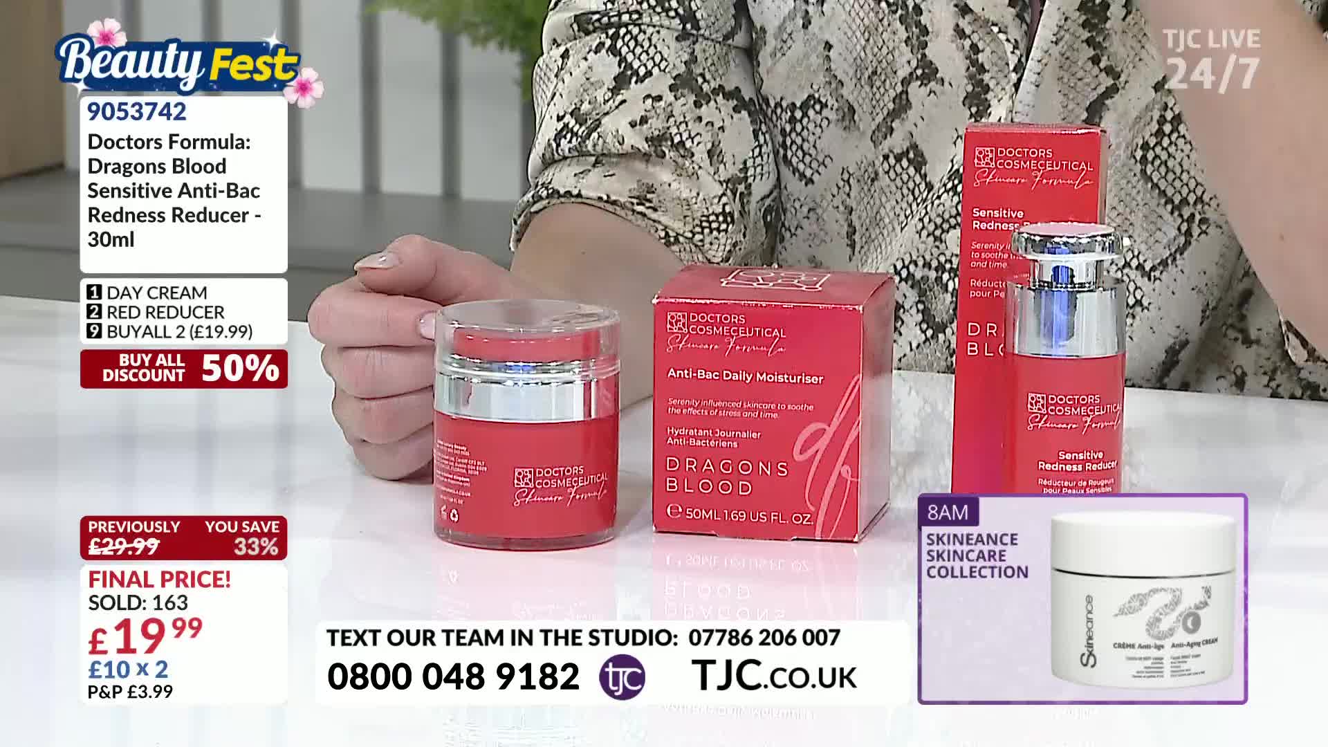 A person holds up a red jar and a box of "Dragons Blood" skincare products, likely for a TJC broadcast. The screen displays a price reduction and contact information for viewers in the United Kingdom.
