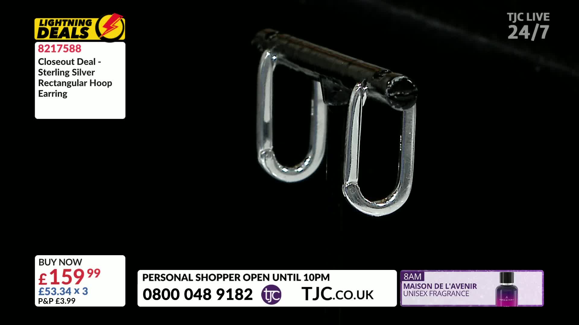 A pair of silver rectangular hoop earrings hangs against a black background, illuminated for a TJC jewelry sale. The price and product details flash on the screen, part of a "Lightning Deals" promotion.
