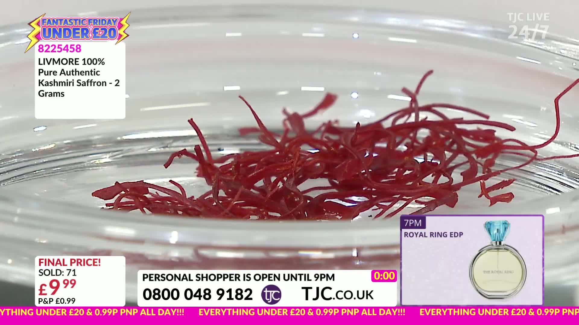 A small pile of deep red saffron threads sits in a clear glass dish. The on-screen graphics from the UK's TJC channel show it's on sale for under a tenner.
