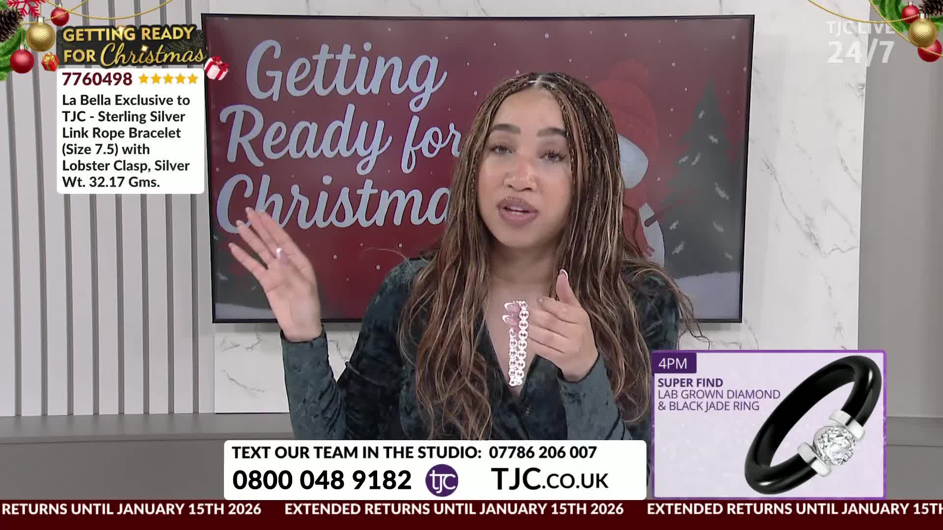 A woman on TJC is holding a silver bracelet, gesturing towards a screen with "Getting Ready for Christmas" displayed. She's talking to the camera, and a graphic for a ring is visible on the right.
