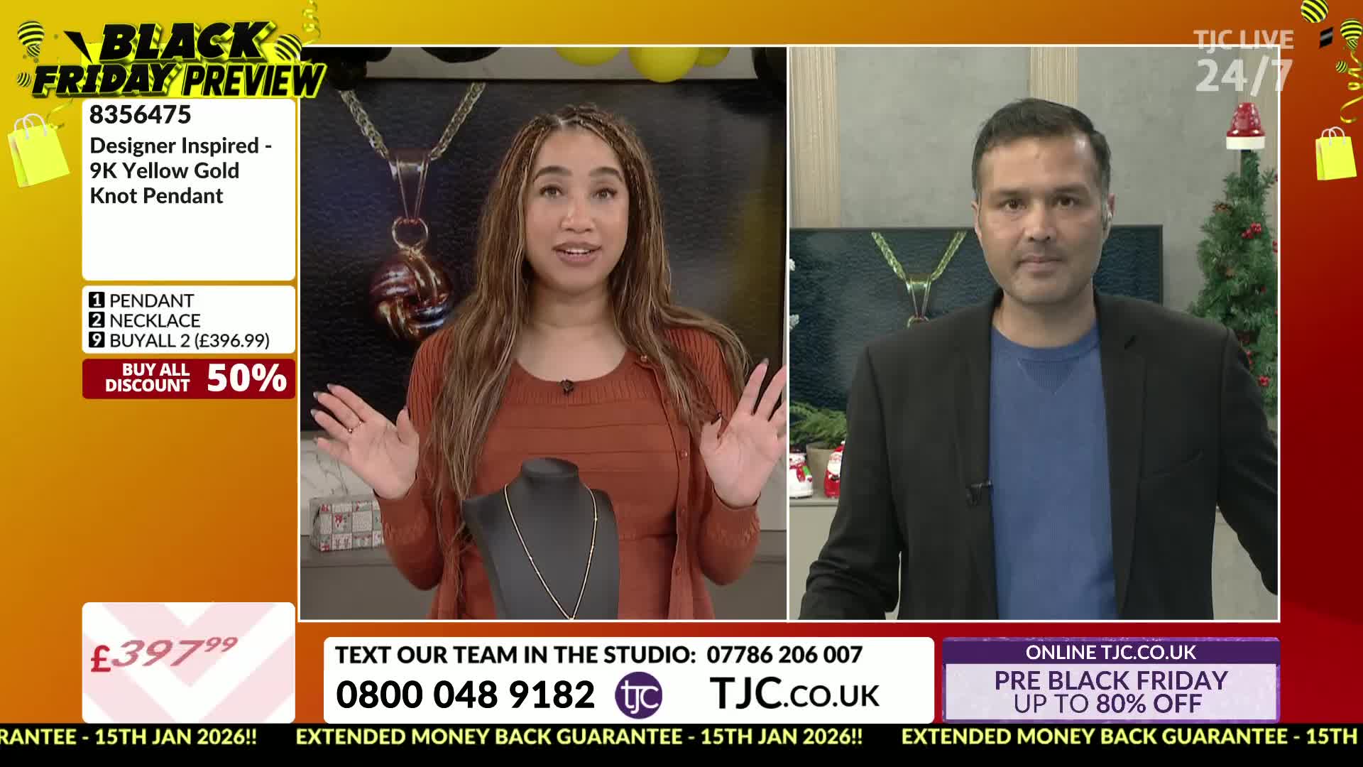 A woman in an orange sweater gestures toward a necklace on a display, while a man in a black blazer stands beside her. The TJC Black Friday Preview is underway, with a "Designer Inspired" pendant featured.
A woman in an orange sweater gestures toward a necklace on a display, while a man in a black blazer stands beside her. The TJC Black Friday Preview is underway, with a "Designer Inspired" pendant featured.