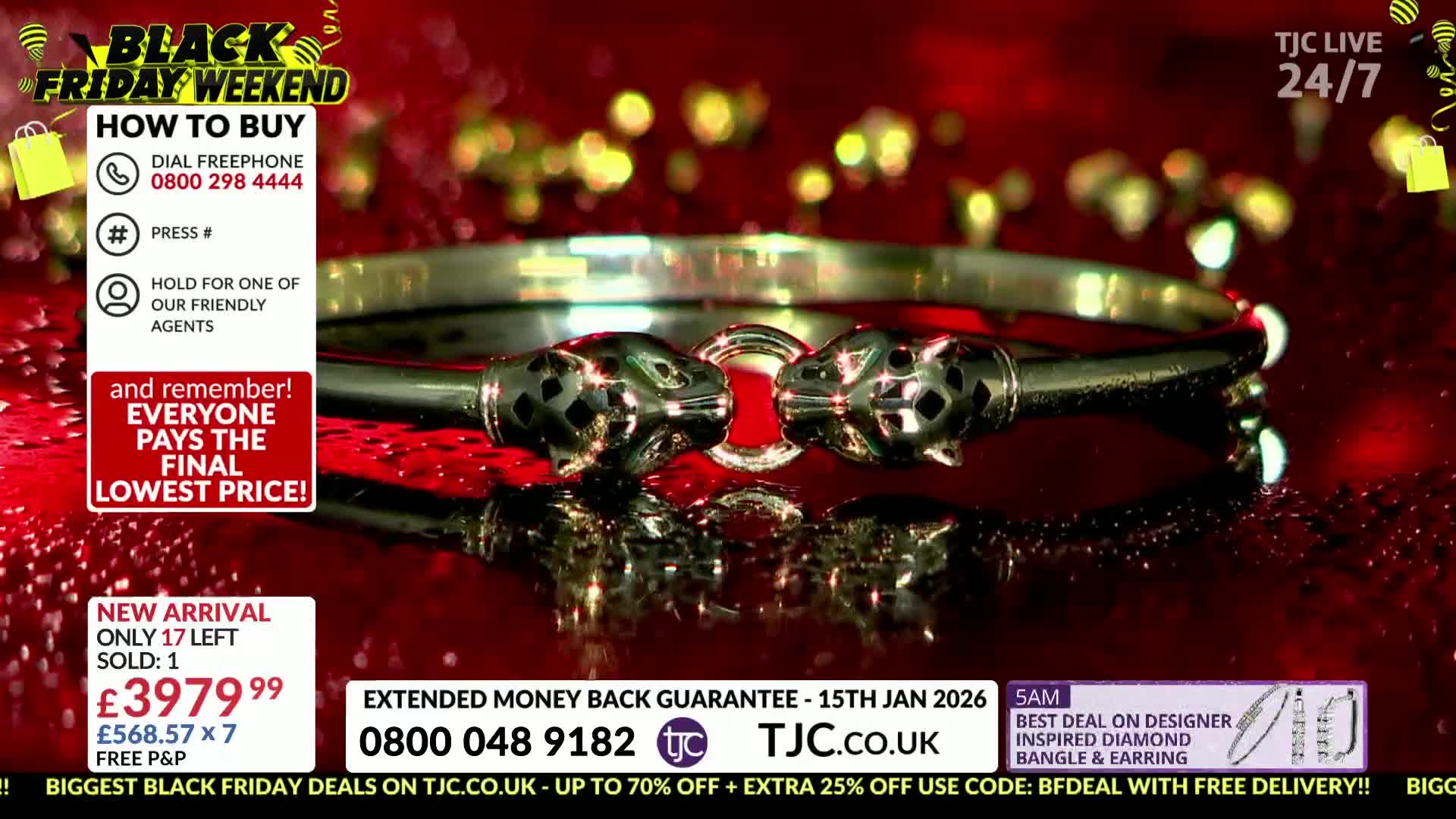A silver bracelet, featuring two jaguar heads, sits on a reflective surface. The TJC studio lights glint off the polished metal, highlighting the intricate details of the design.
A silver bracelet, featuring two jaguar heads, sits on a reflective surface. The TJC studio lights glint off the polished metal, highlighting the intricate details of the design.