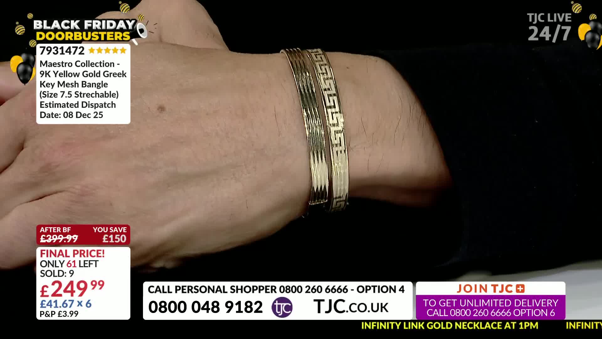 A hand, likely on a TJC show, displays two gold bangles with a Greek key design. The bracelets sit on a wrist, reflecting the studio lights.
A hand, likely on a TJC show, displays two gold bangles with a Greek key design. The bracelets sit on a wrist, reflecting the studio lights.
