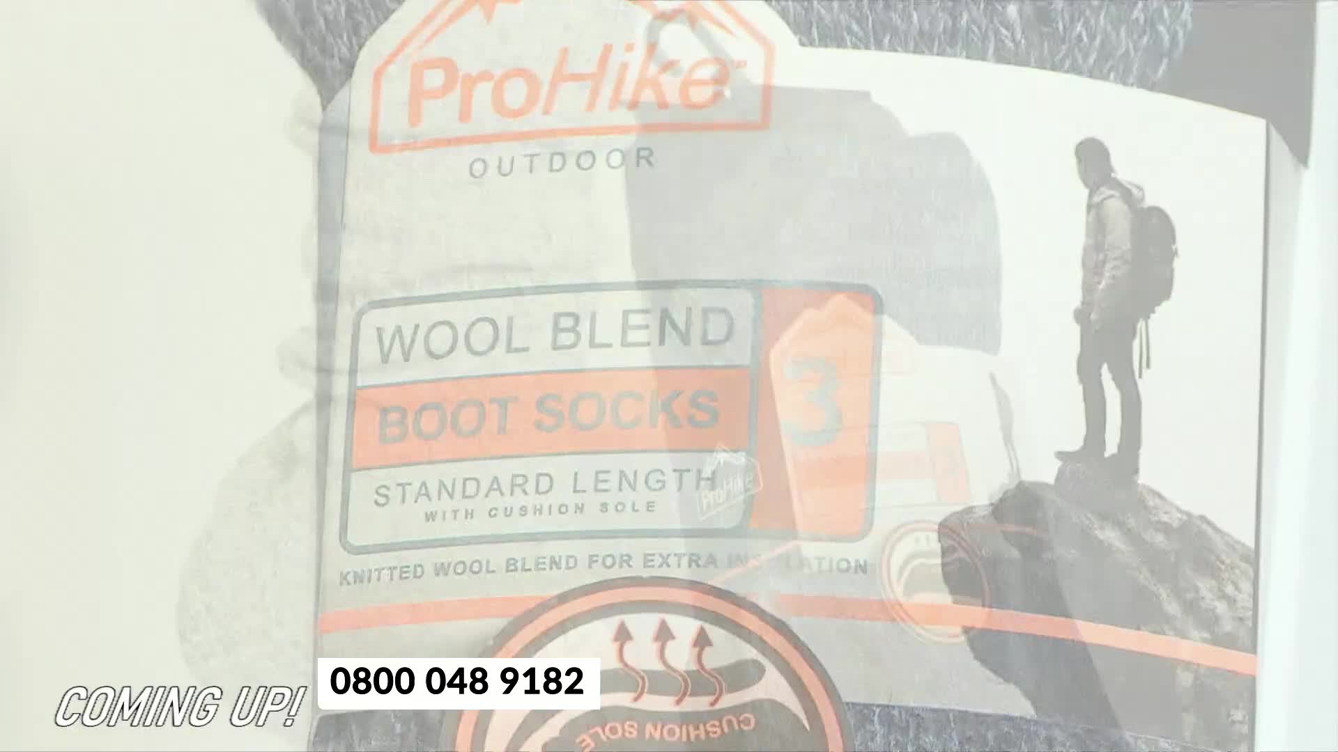 A pack of wool blend boot socks is prominently displayed, with a hiker silhouetted in the background. The phone number 0800 048 9182 appears below the product, signaling an upcoming offer.
A pack of wool blend boot socks is prominently displayed, with a hiker silhouetted in the background. The phone number 0800 048 9182 appears below the product, signaling an upcoming offer.