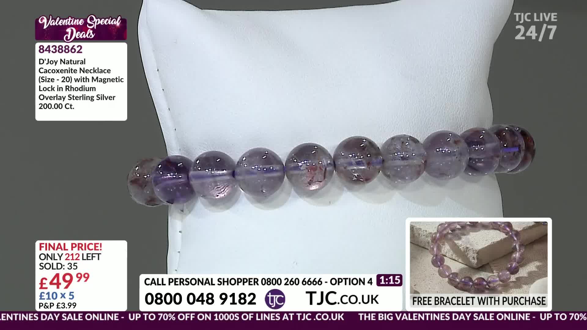 A strand of large, translucent purple beads, each with internal striations, rests on a white display. The TJC logo and Valentine's Day sale information are visible on the left and bottom of the screen.