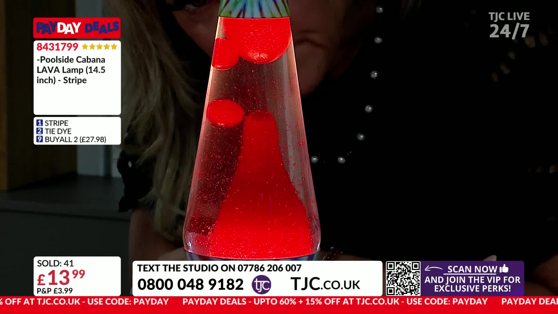Red blobs are rising and falling inside a glass lamp. The TJC logo is visible in the corner, advertising a "Poolside Cabana LAVA Lamp."