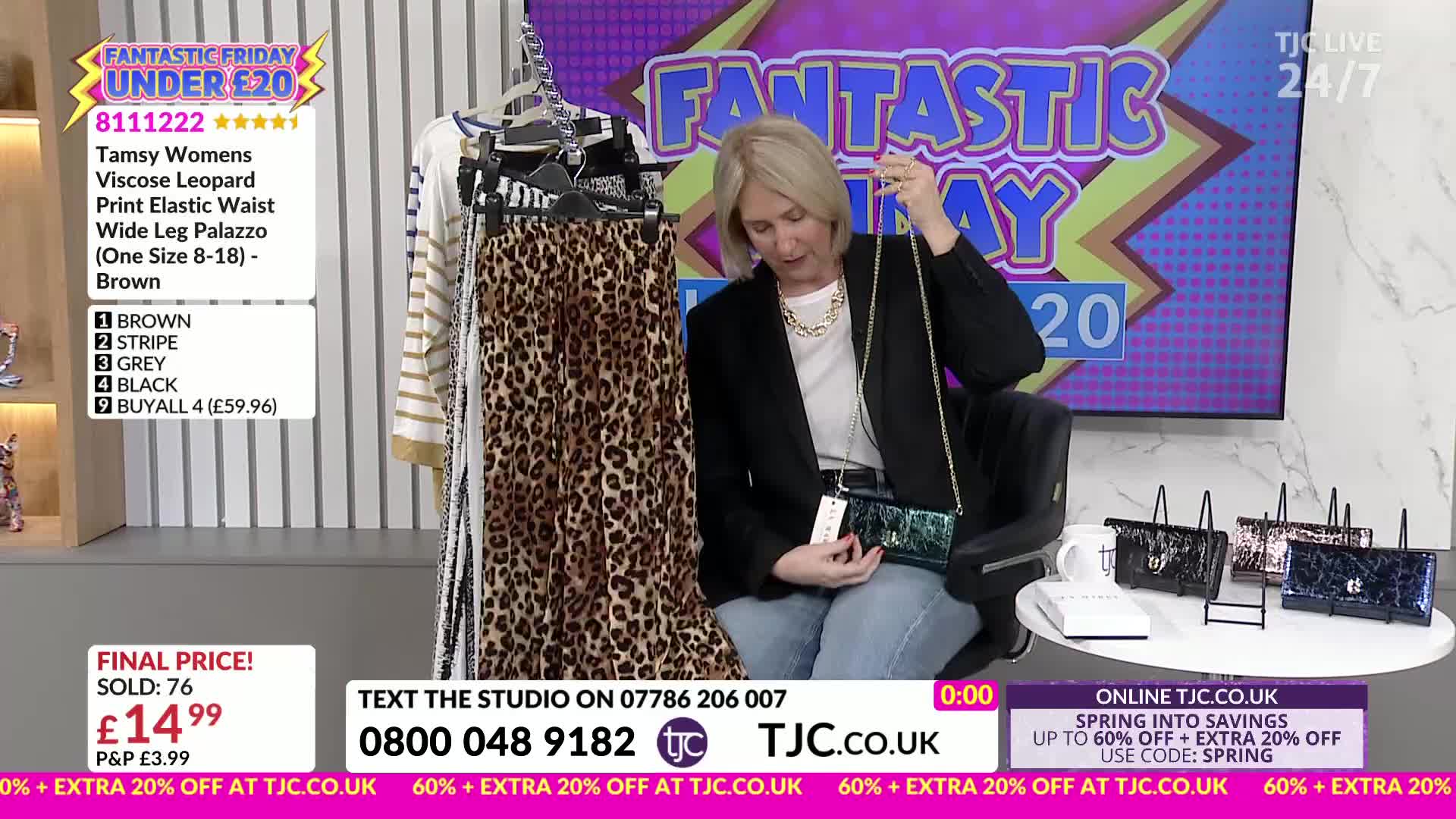 A woman on TJC is showing off a leopard print palazzo pant and a sparkly clutch bag. Several other clutch bags are displayed on a table next to her.