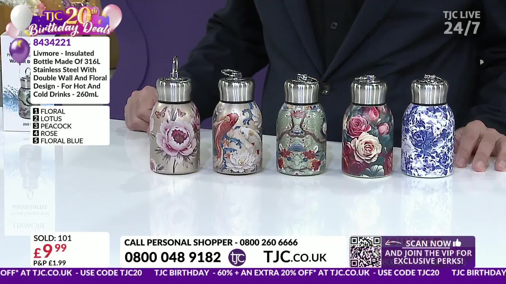 Five patterned bottles stand in a row on a white surface. A man's hands are visible on the right, near the last two bottles.