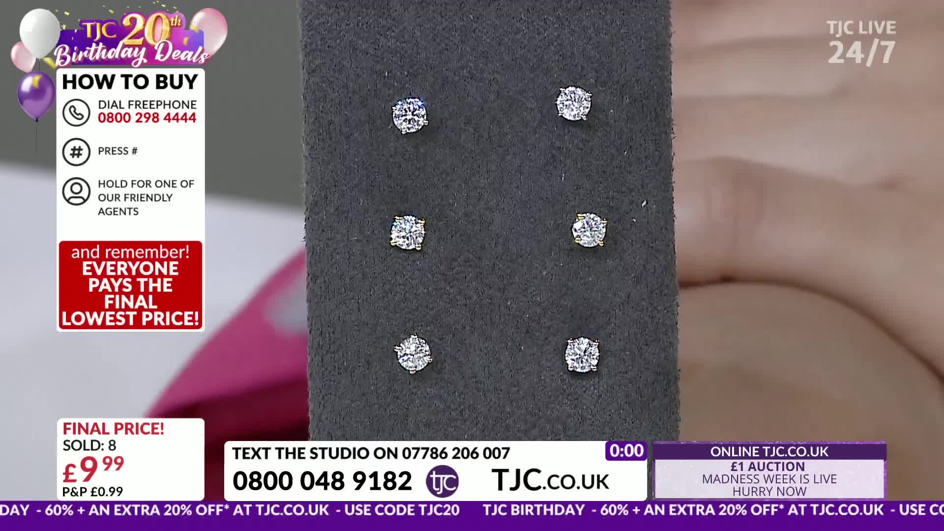 Six small, sparkling diamond stud earrings are displayed on a dark grey velvet stand. A bright pink box and a white "How to Buy" graphic are visible to the left.