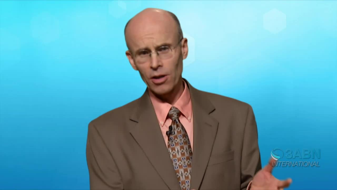 A man in a suit, wearing glasses, is speaking and gesturing with his hands. The 3ABN International logo is visible in the lower right corner.
