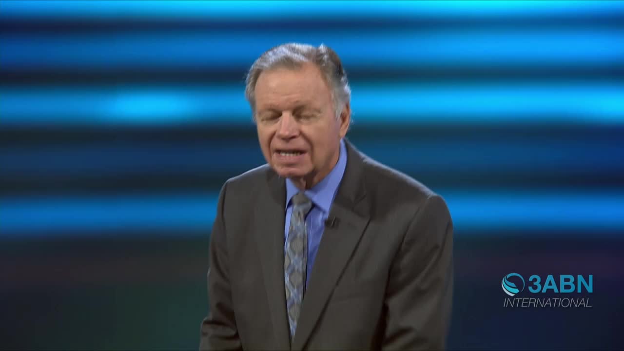 A man in a suit speaks, his mouth open as if mid-sentence. The 3ABN International logo is visible in the bottom right corner.
