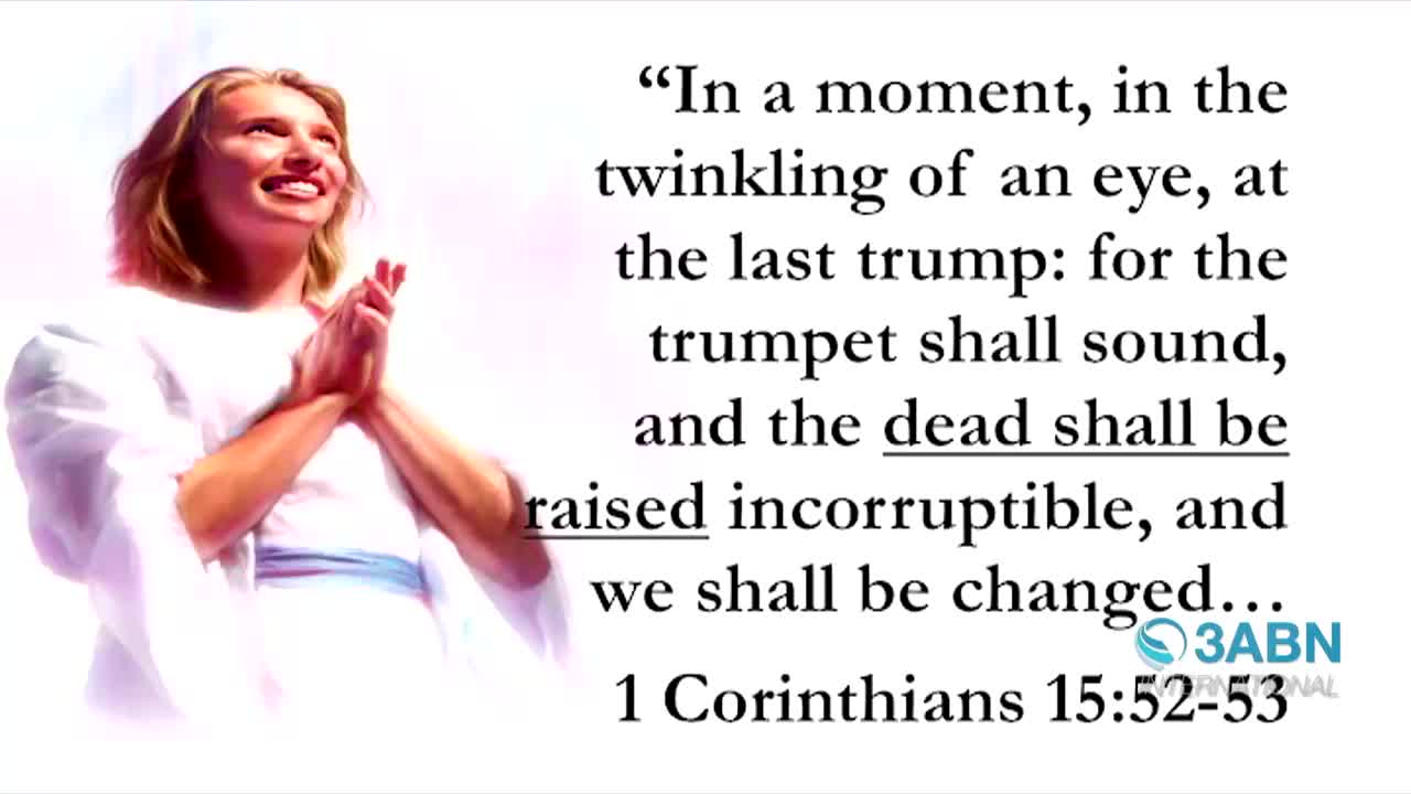 A smiling person in white clothing looks upward, their hands clasped together. Text from 1 Corinthians, a common theme on 3ABN International, frames the scene.
