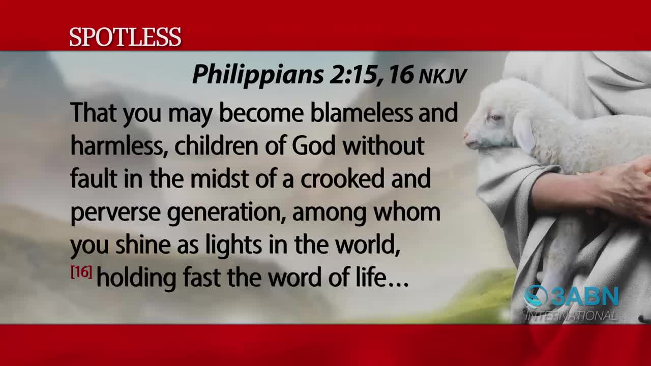 A gentle hand cradles a small, white lamb against a backdrop of text from Philippians. The 3ABN International logo is visible in the lower right corner.