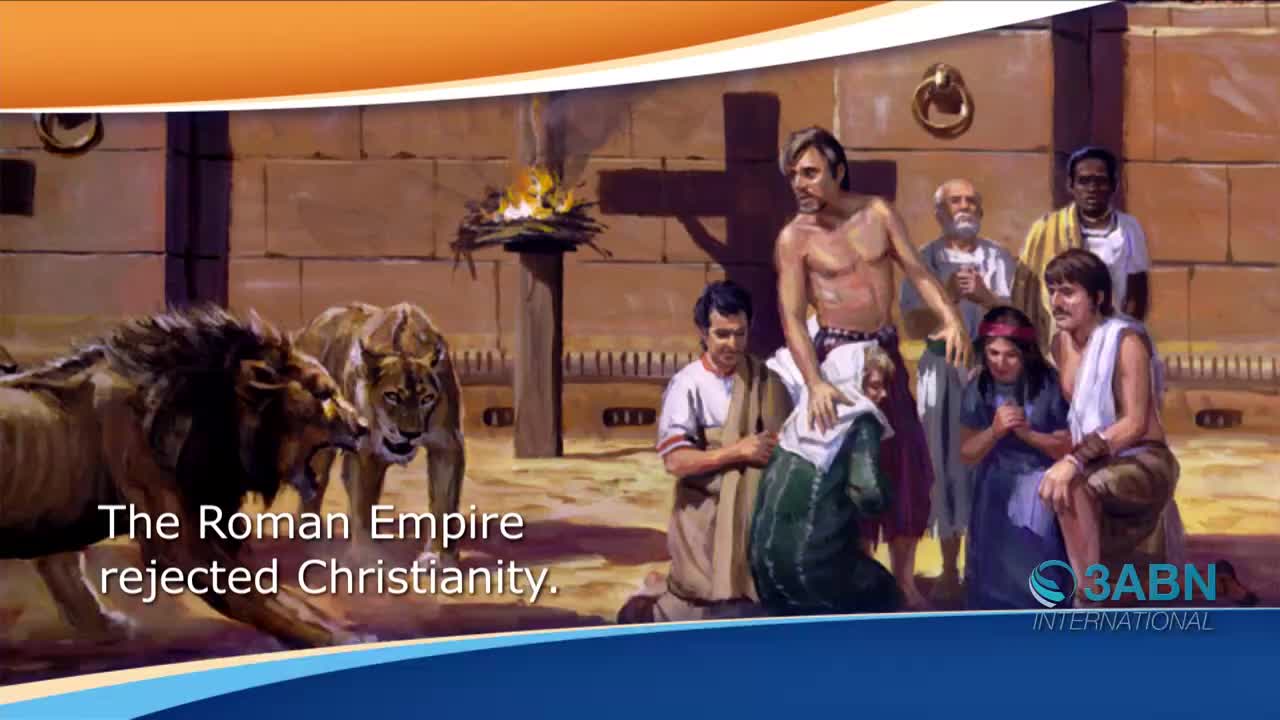 Two lions are lunging forward, their teeth bared. A group of people stand by a cross, some in prayer, while a man in a white cloth shields a woman.