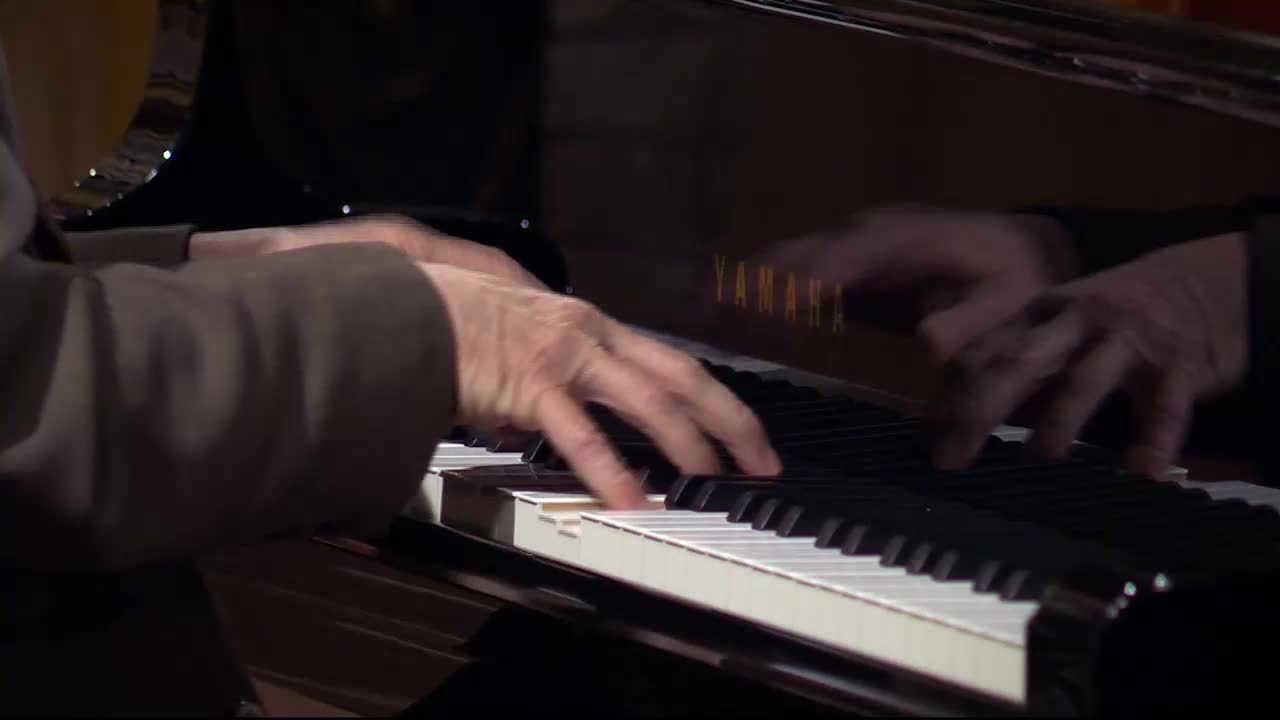 Fingers dance across the Yamaha keys, a familiar sight during a 3ABN Praise Him Music Network broadcast. The polished wood gleams as the music fills the room.