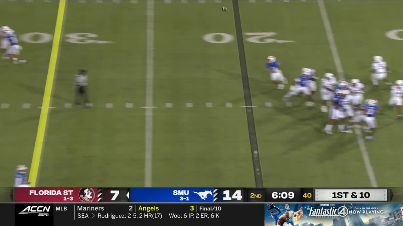 The SMU Mustangs are on offense, and the ball is snapped. The Florida State Seminoles defense is closing in on the offensive line.
