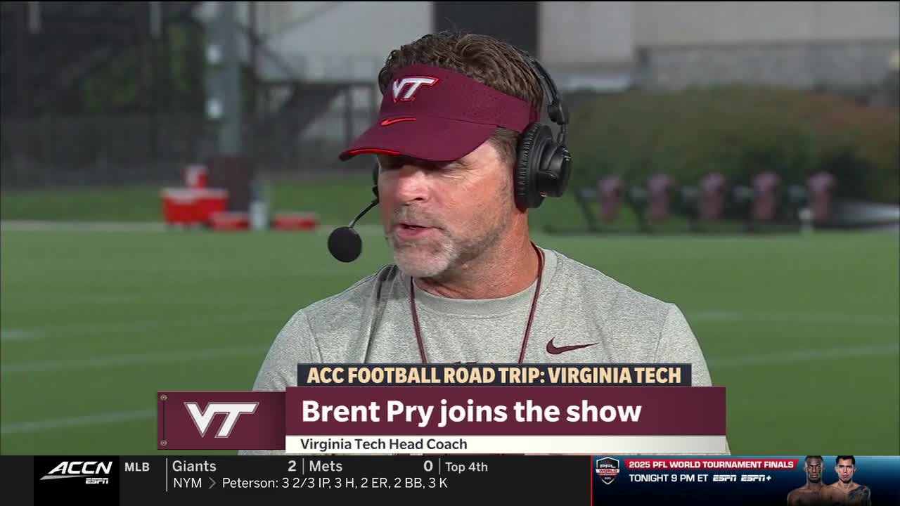 Virginia Tech's head coach, Brent Pry, is speaking into a microphone, wearing a maroon visor and headset. The ACC Network graphic identifies the segment as part of its football road trip.
