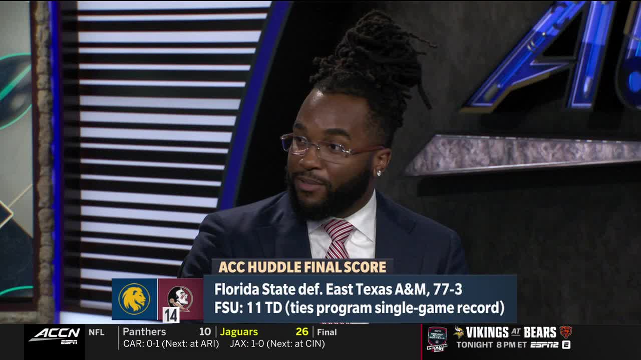 On the ACC Network, a man in a suit, glasses, and a patterned tie is speaking. The screen displays the final score of a Florida State football game.
