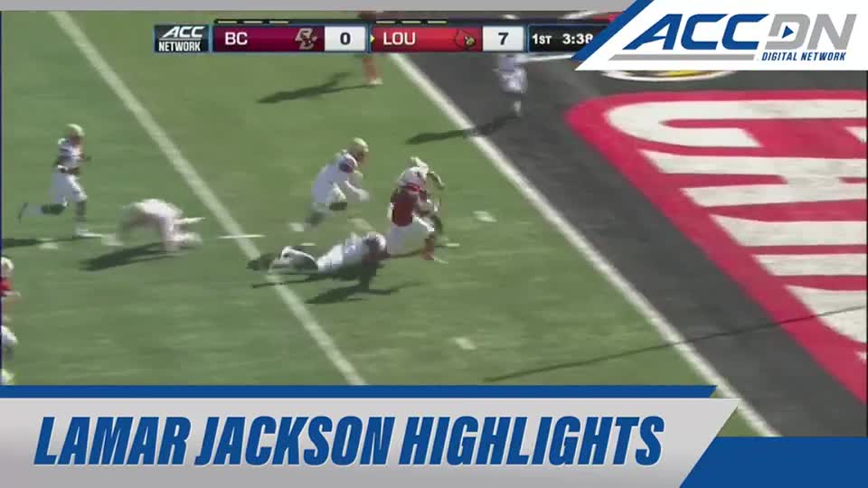 A Louisville player in red is sprinting towards the end zone, pursued by a few Boston College defenders. One defender is already on the ground, trying to make a tackle.
