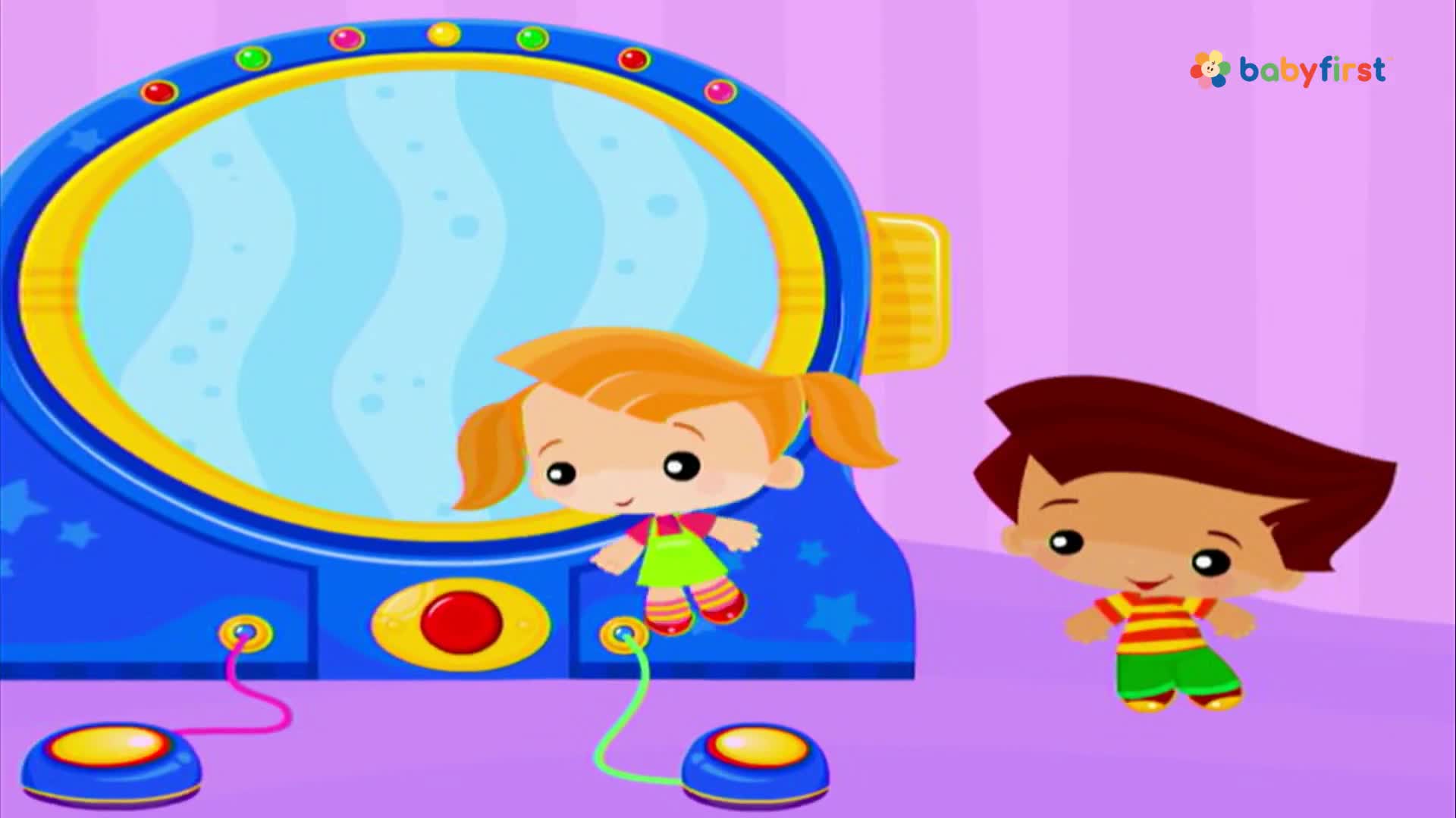 A girl with pigtails floats near a blue machine with a screen. Beside her, a boy smiles, looking at the screen.
