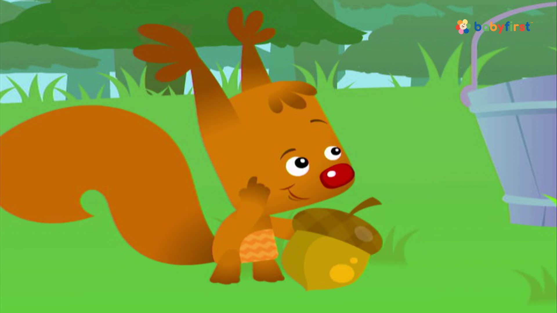 A cartoon squirrel, holding a large acorn, looks thoughtful with a finger to its cheek. The squirrel stands on green grass near a bucket.
