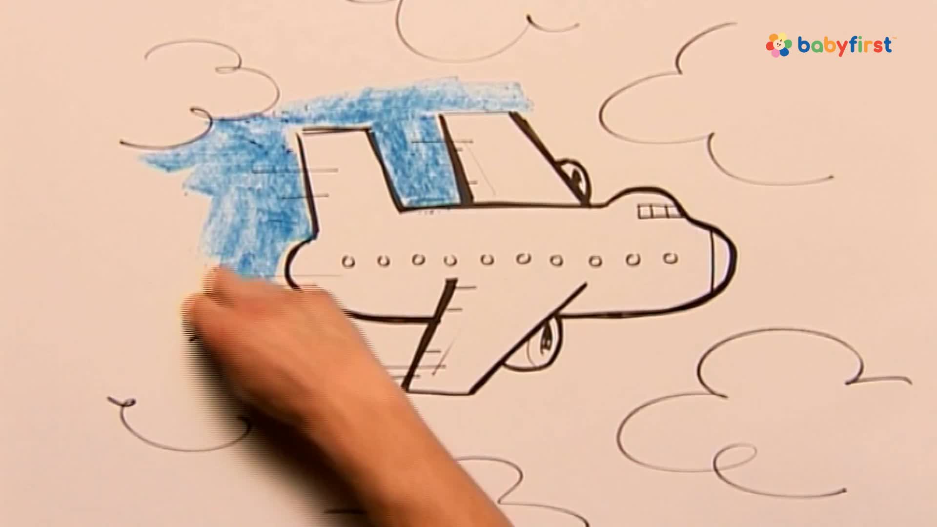 A hand is coloring the top of a drawn airplane blue, filling in the outline. The plane is sketched on a white background with simple cloud shapes.
