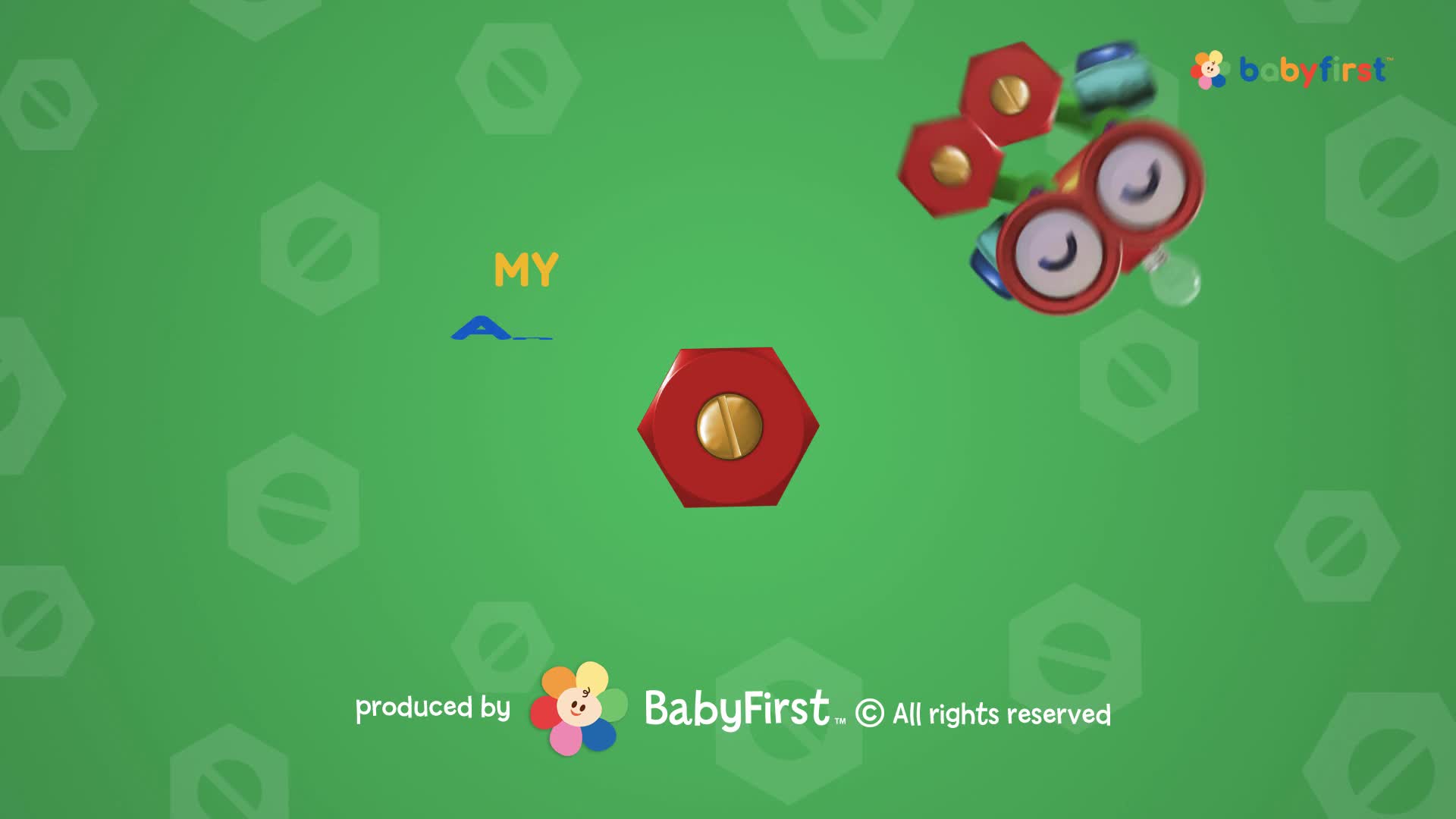 A red hexagon with a gold center sits in the middle of the screen. Up above, a collection of red and blue shapes with eyes floats around.
