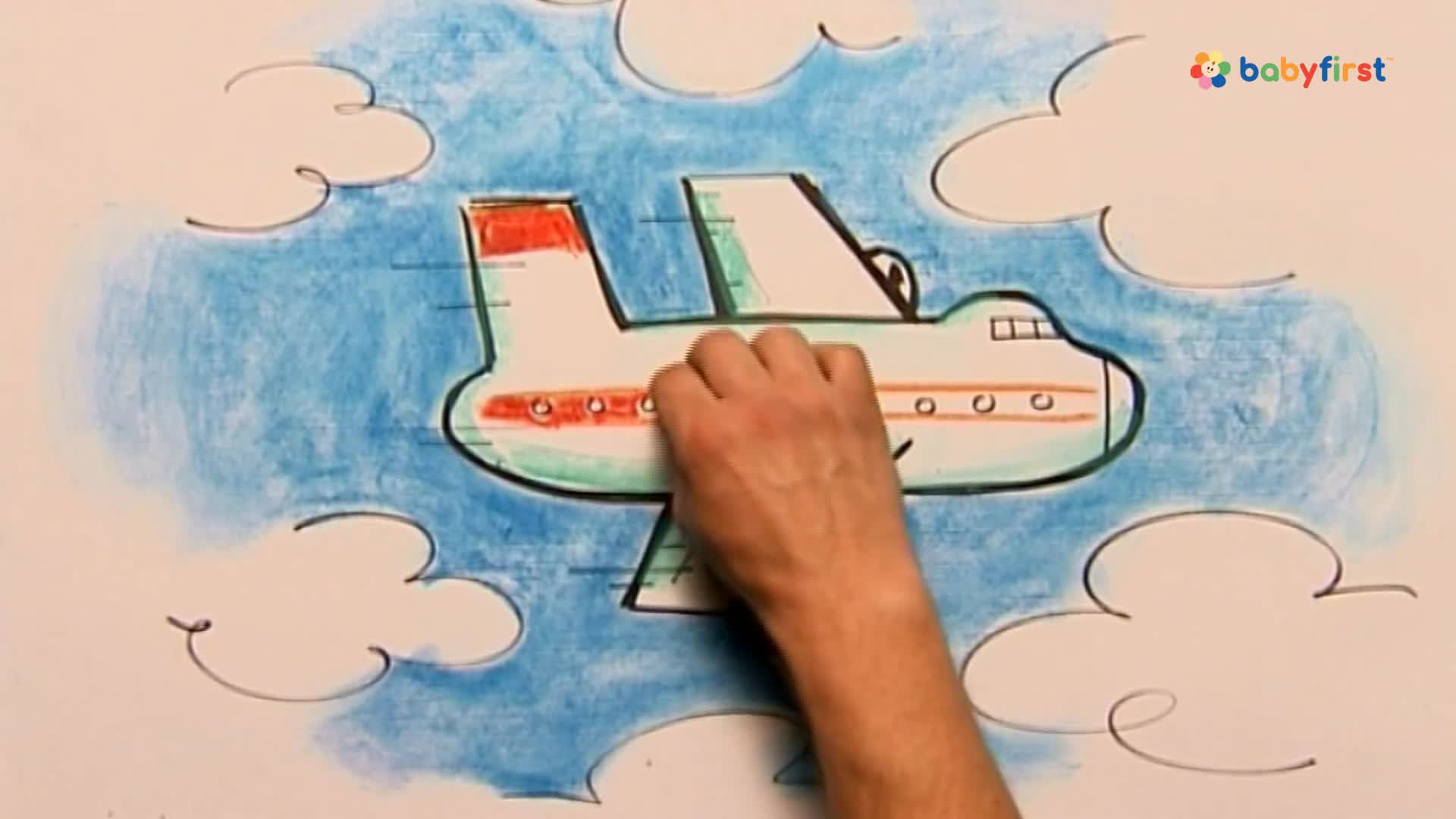 A hand is drawing a cartoon airplane with red and green accents against a blue sky. The plane is being outlined with a black marker, and the background includes simple white clouds.

