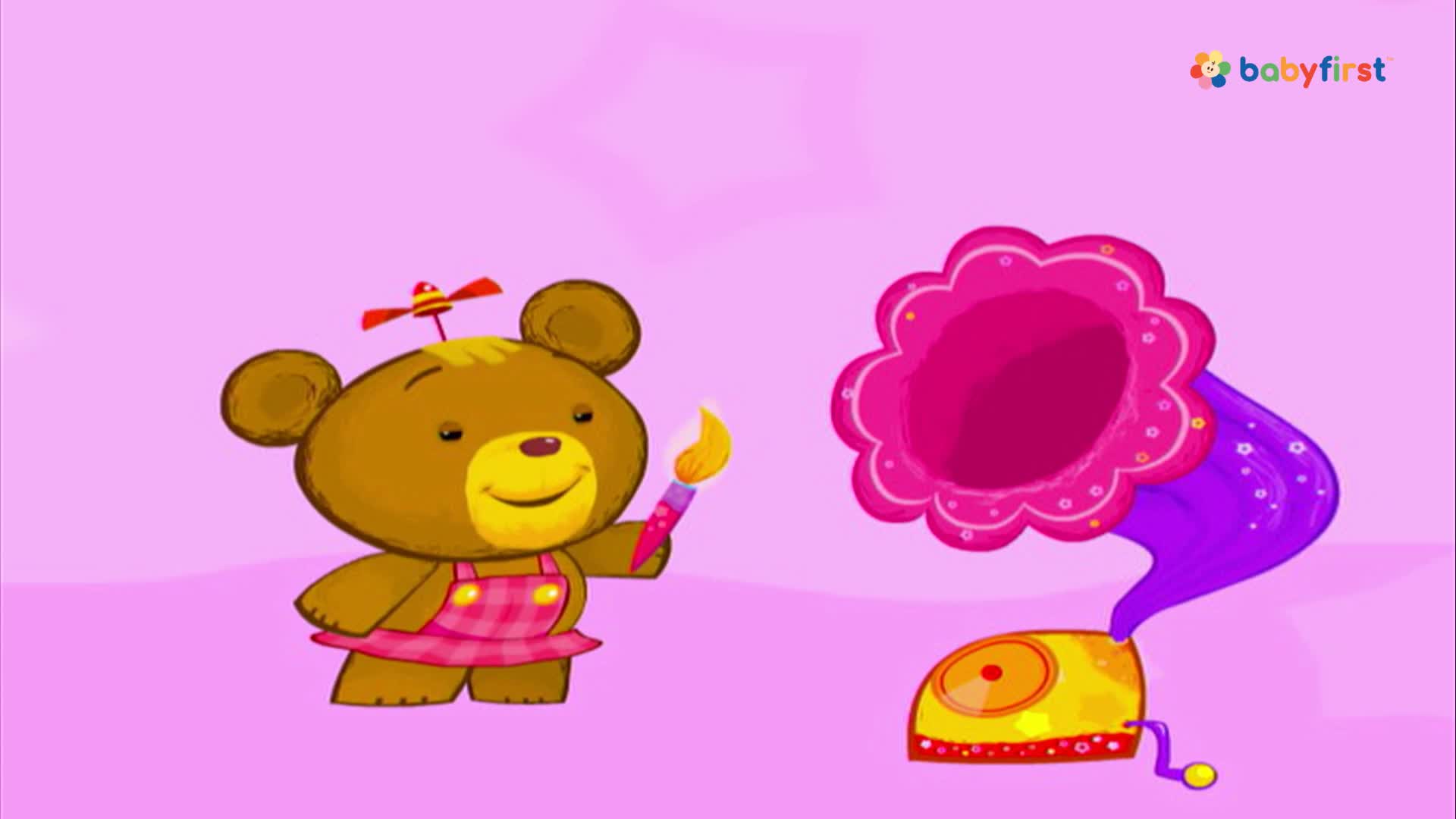 A brown bear in a pink dress holds a paintbrush, facing a large, flower-shaped gramophone. The bear seems to be smiling at the musical instrument.
